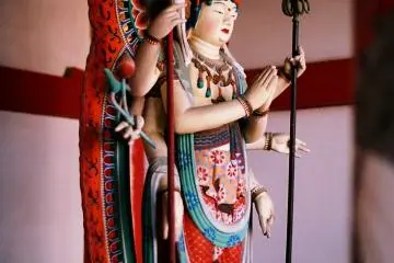 <p>The statue of 'Senju Kannon (Goddess of Mercy with 1000 hands)' housed inside the outer gate</p>